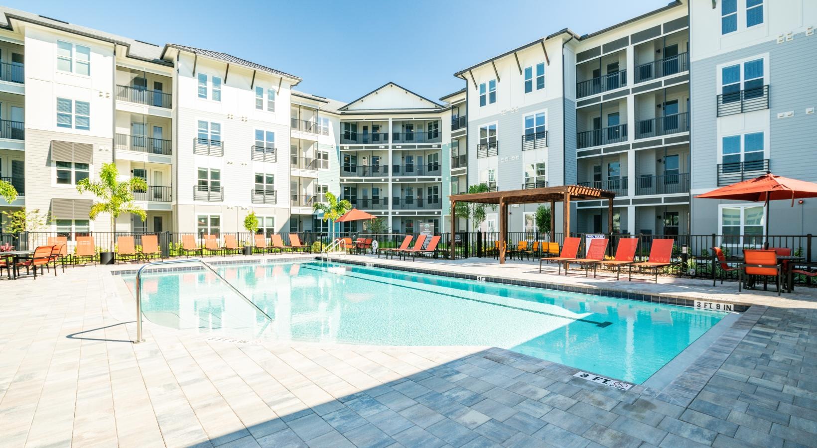 townhouse building with pool